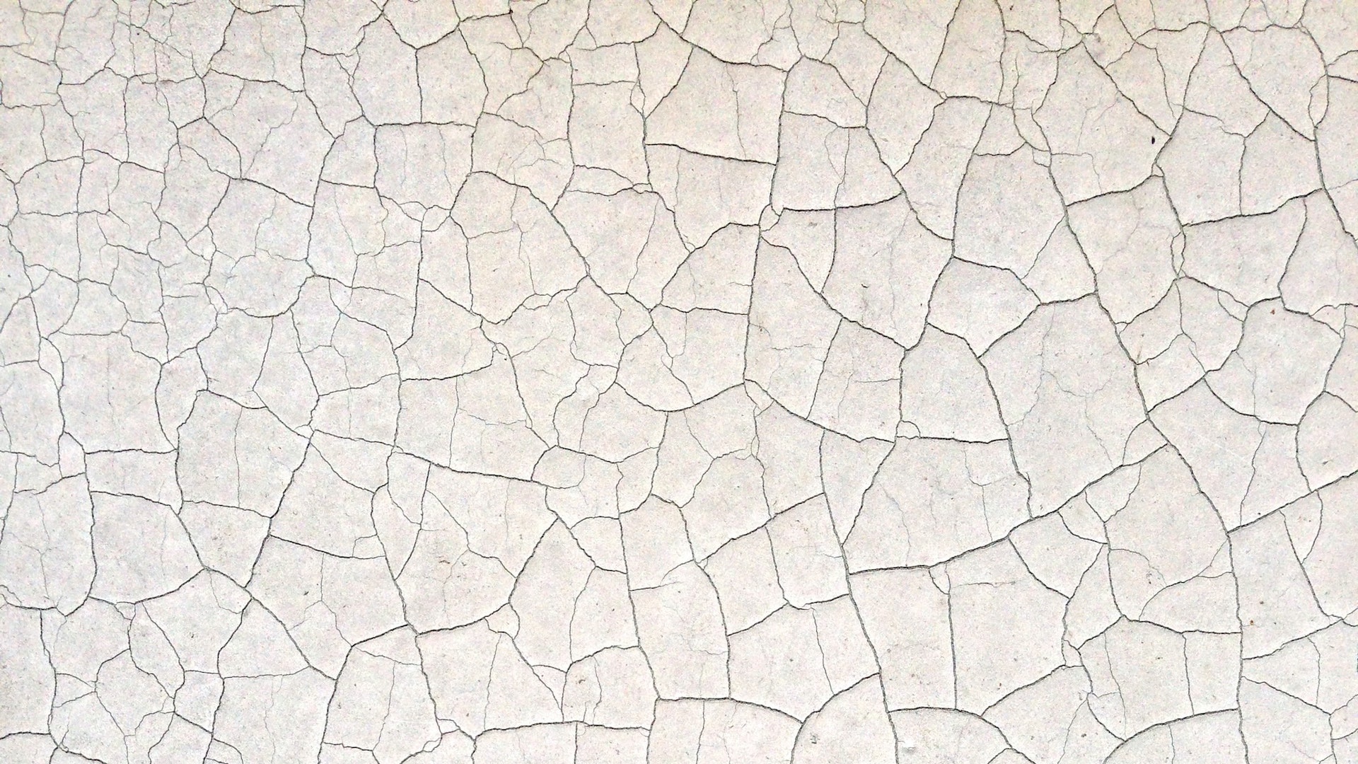 細かいひび割れのある白い壁の無料バーチャル背景素材